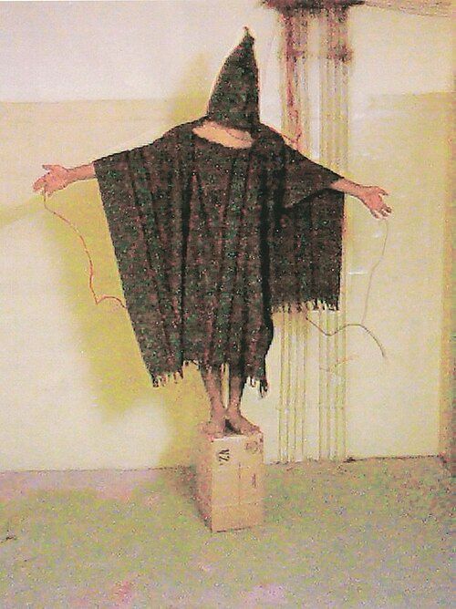 "The Hooded Man" - Infamous photo of torture conducted at the Abu Ghraib prison by the US military during the invasion of Iraq.
