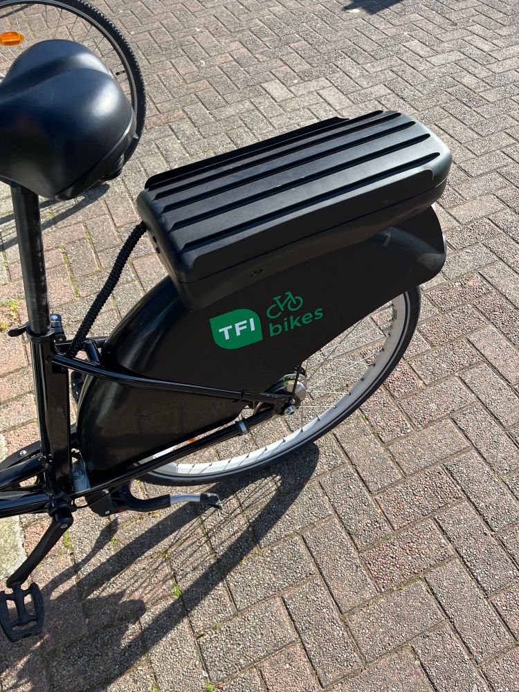 Image of back wheel of ebike with battery 