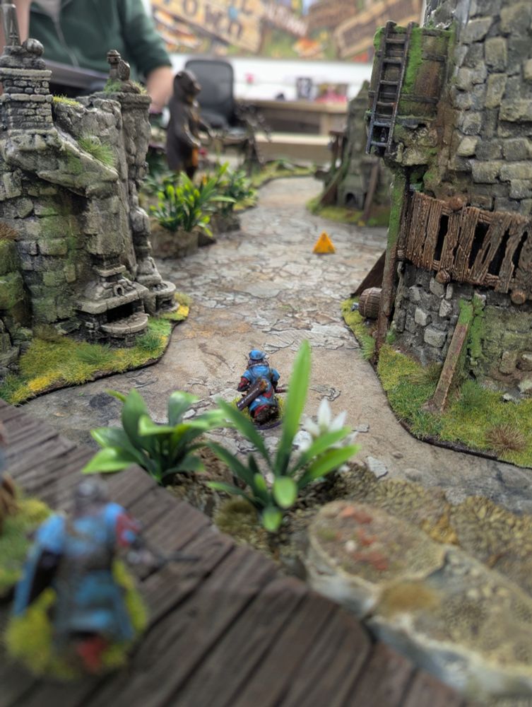 Fish folk approach the bear with apprehension