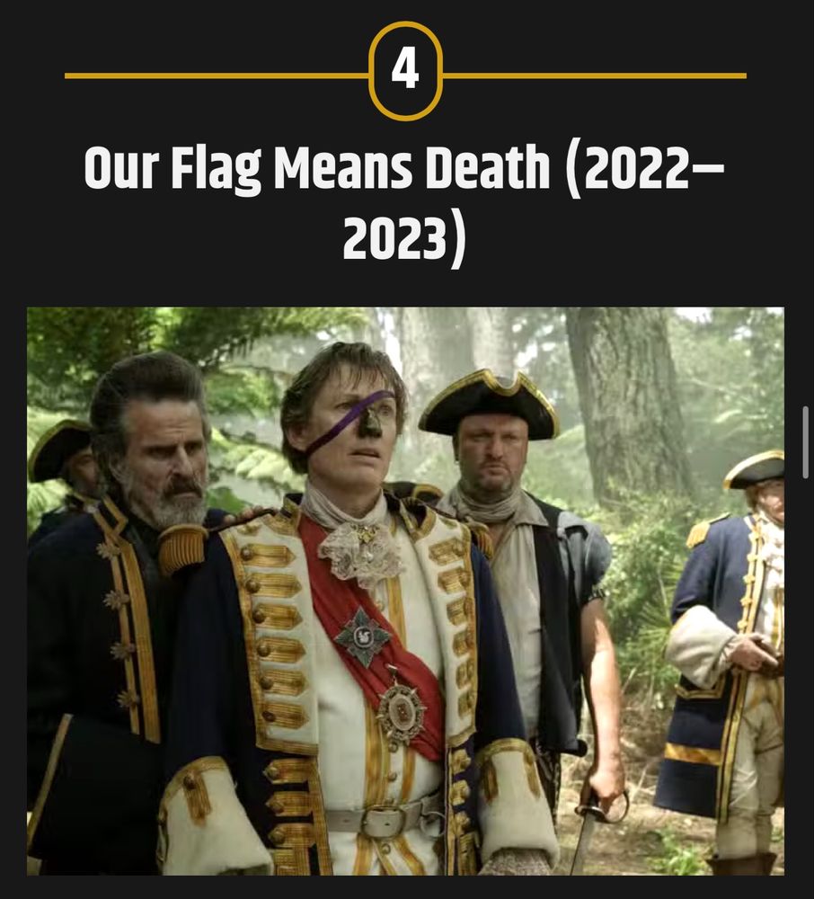 A screencap from OFMD with Ricky, Izzy, and Pete dressed in British uniforms