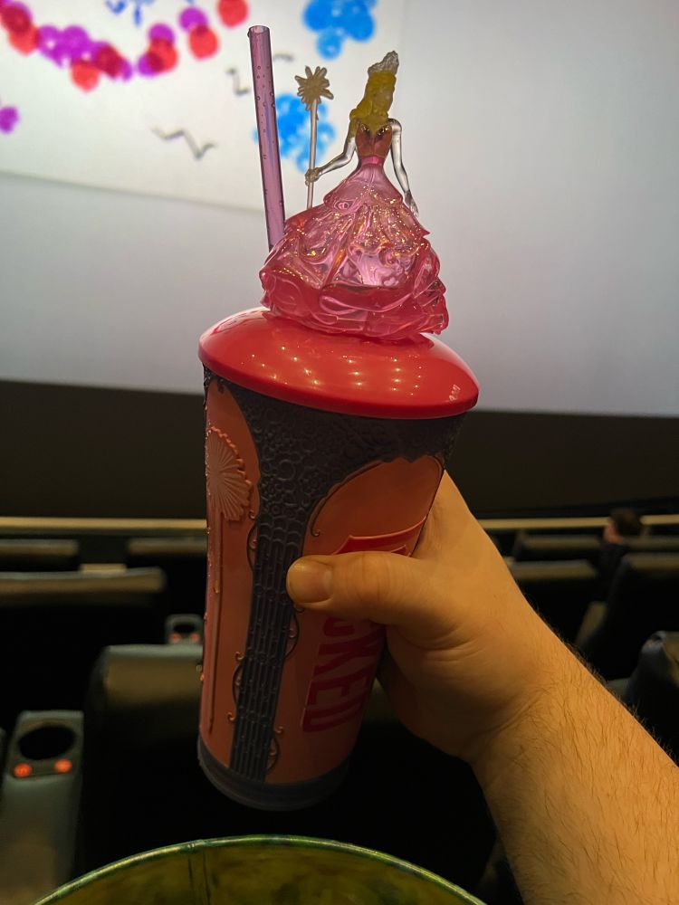 This is a picture of Pink, Glinda the Good themed cup, for the film Wicked at AMC theaters. 