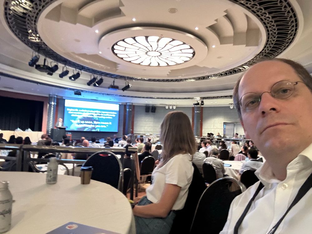 Ballroom of experts listening to Steve Wilson’s keynote at the FIDO seminar in Melbourne