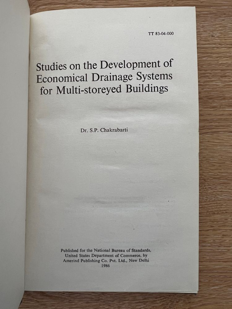 Front page of book titled “Studies on the Development of Economical Drainage Systems for Multi-storeyed Buildings”