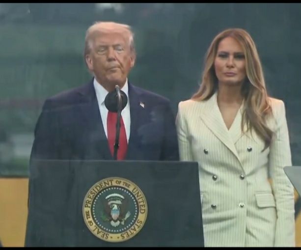 Screenshot of Trump and Melania at his birthday bust parade. 