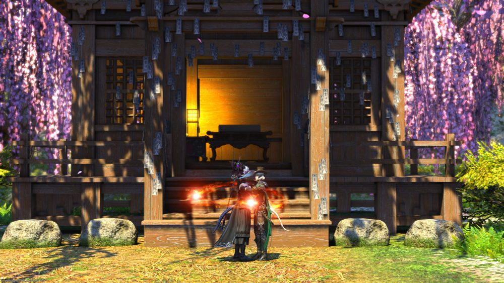 Yozora and her friend hug in front of a shrine