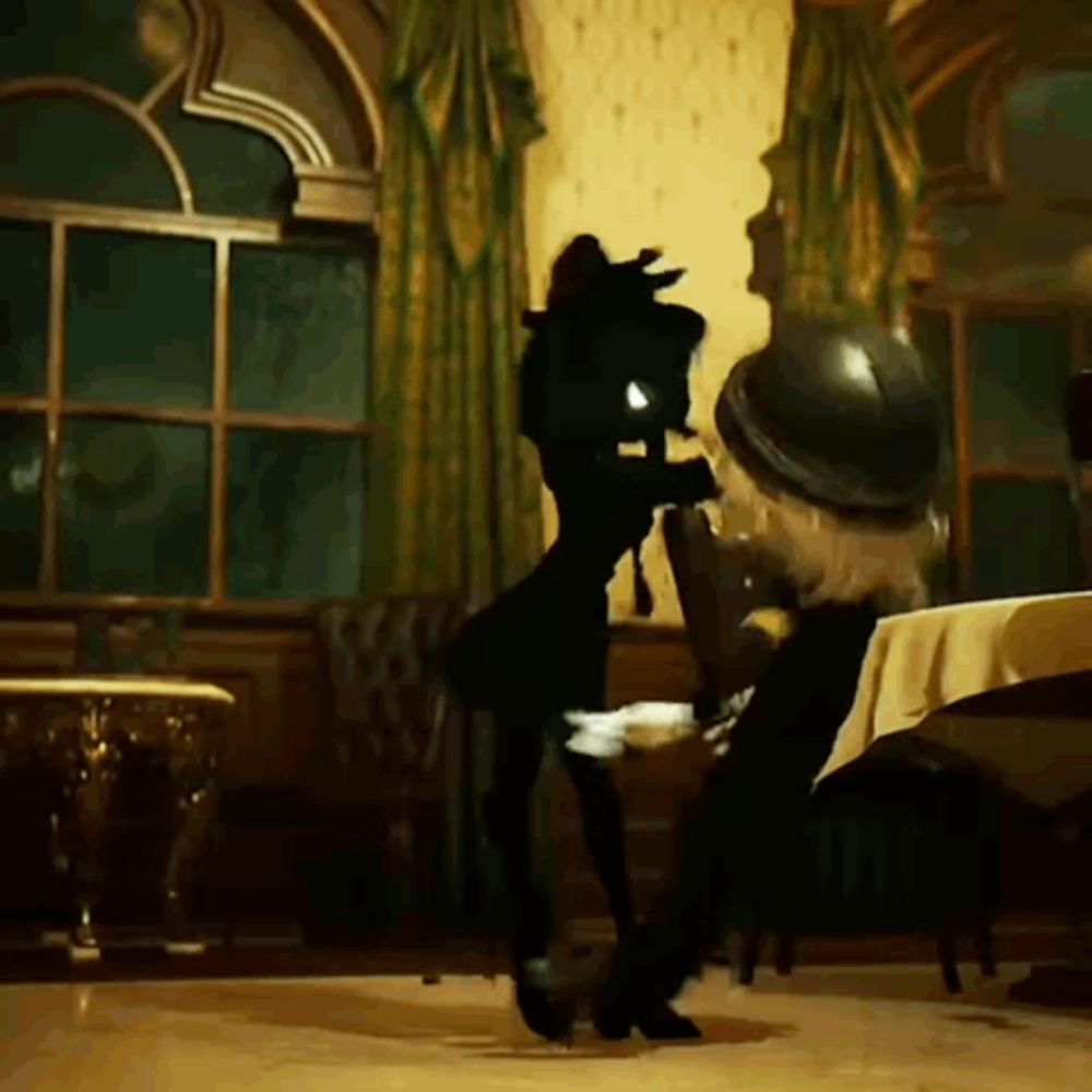 a silhouette of two women dancing in a room with a table in the background