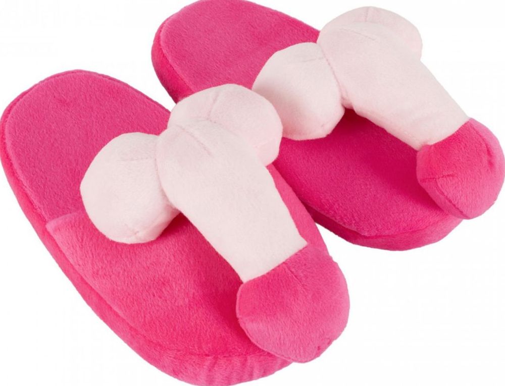 Pinke Plüsch-FlipFlops mit Halteriemen in Penisform. Fragt nicht...