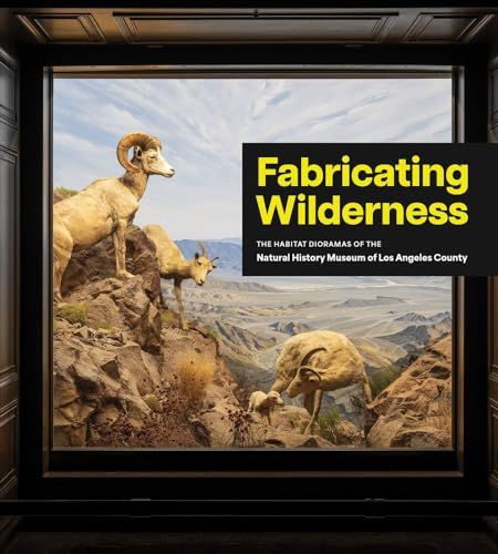 Cover of the book "Fabricating Wilderness" showing a diorama of a family of mountain goats overlooking a valley in the background.