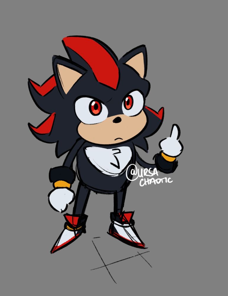 Baby Shadow glares up at the viewer and holds up his middle finger 😬