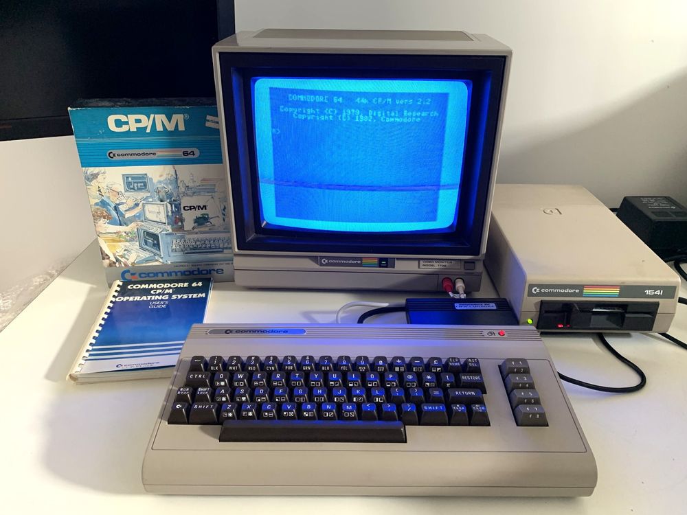 This is a picture of a Commodore 64 running the CP/M operating system from a cartridge Commodore had made available.  It uses the standard monitor and 1541 disk drive to load it's operating system and store/retrieve CP/M compatible files.