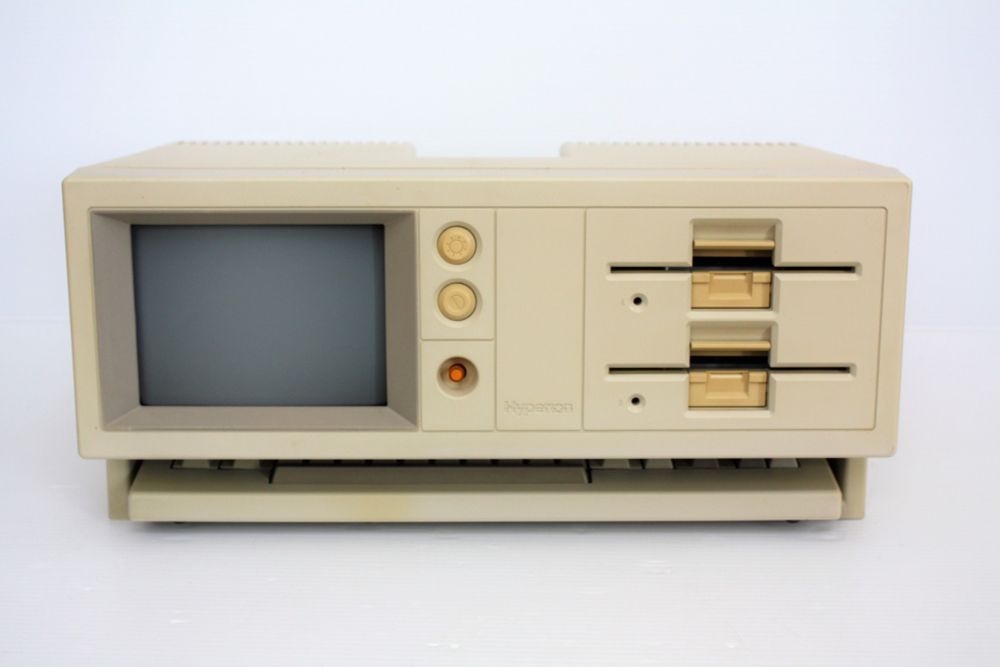 Here is the Hyperion with the keyboard tucked into the "garage" at the bottom.  It also had a carry bag (not shown) that made it highly portable and it didn't weigh a ton like most luggables of the era.