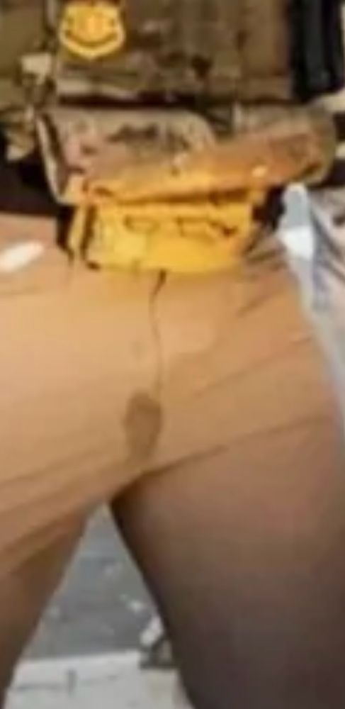 A close up of the troop’s pants, revealing a piss stain