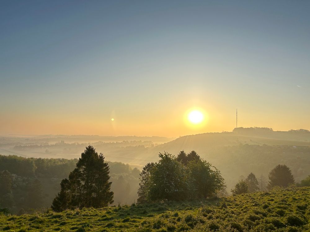 Sunrise over Watership Down. 