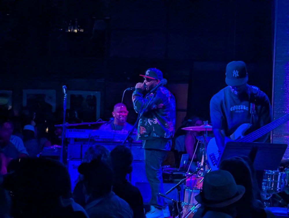 Talib Kweli on stage at the Dakota.