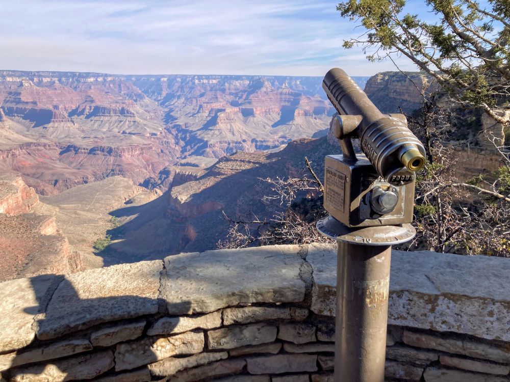picture of the grand canyon including a telescope