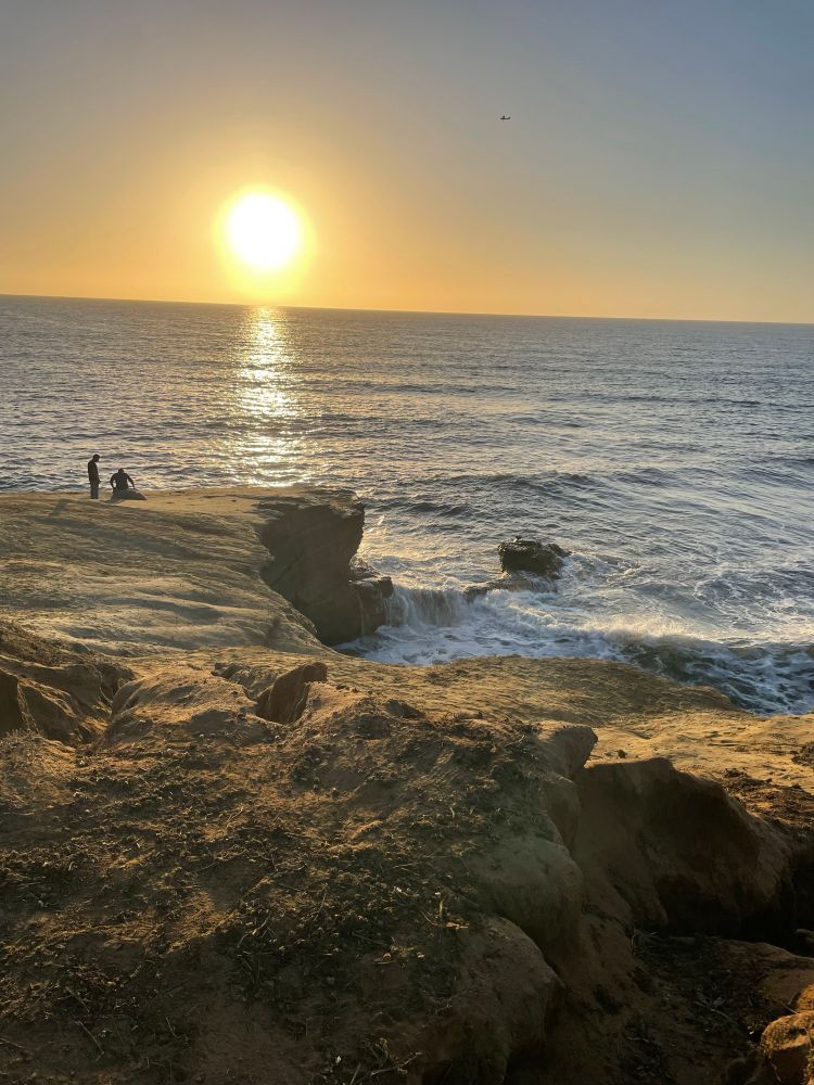The sun setting over the ocean at Sunset Cliffs in San Diego