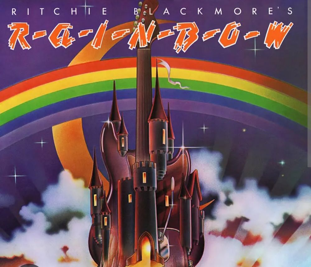 The artwork for the 1975 album Ritchie Blackmore's Rainbow. The main foreground image is a castle, with a guitar neck rising out of the top as if it were a turret. A rainbow arcs across the background. 