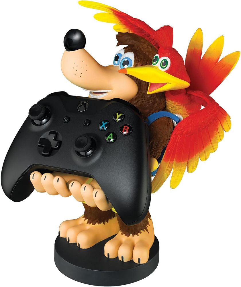 Joined by his inseparable companion stashed in his backpack, this 8.5" Banjo-Kazooie figure will kindly hold your controller, phone, or anything else you can fit into his hands. 𝗚𝘂𝗵-𝗛𝗨𝗛!