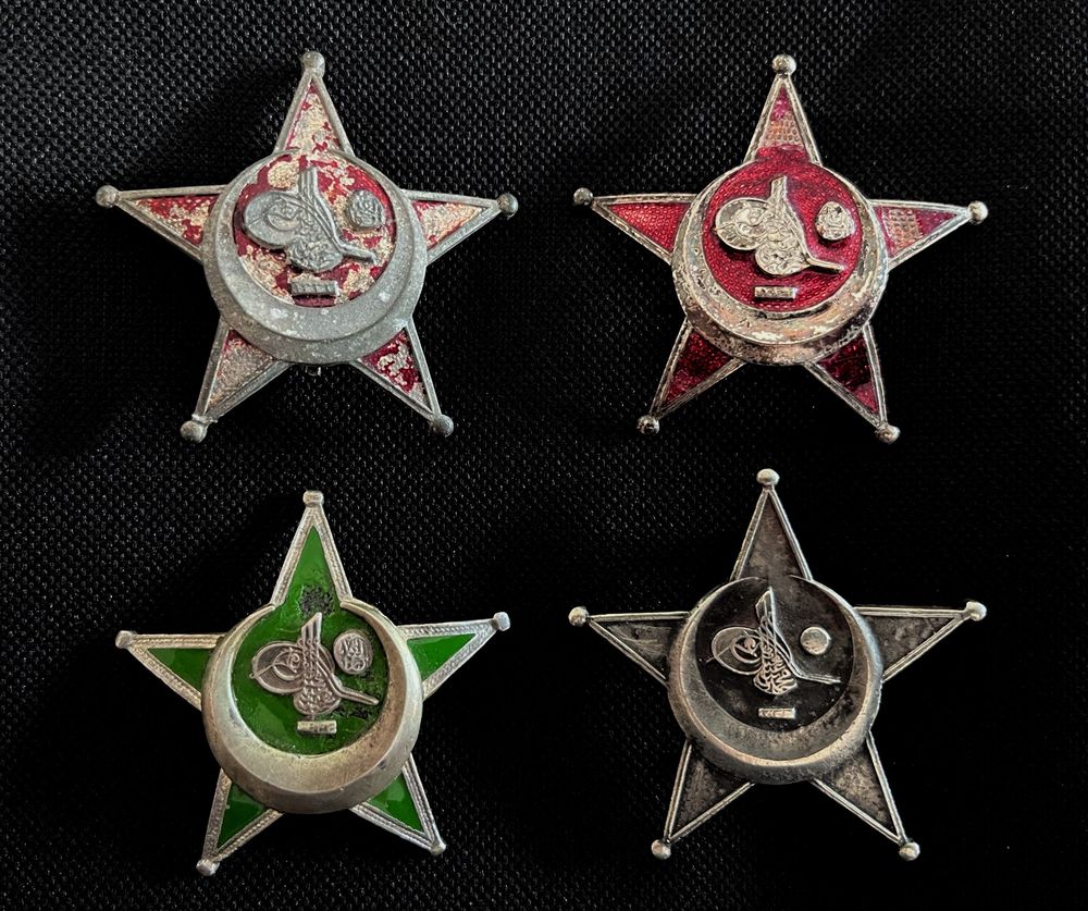 Remembering Ottoman bravery and resistance at Gallipoli: the Ottoman War Medal: TL, original painted version; TR, BB&Co enamel version; BL, re-enamelled in green; BR, unfinished version