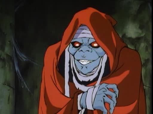 Mumm-ra. A mummy in a red cloak. 