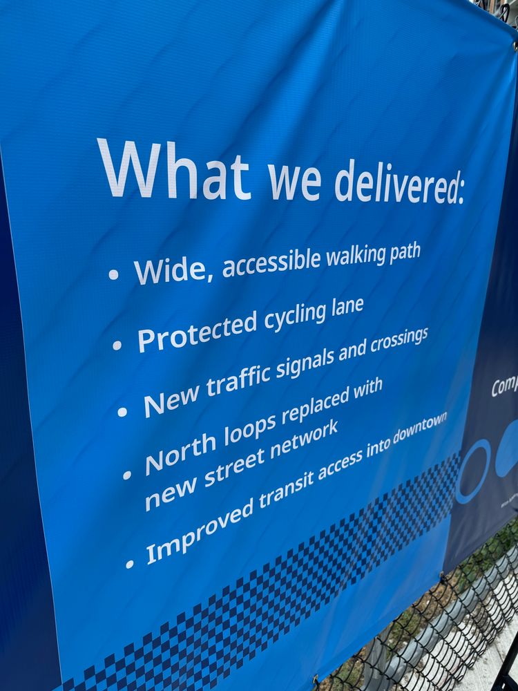 Poster listing the benefits of the project including a wide, accessible walking path and a protected cycling lane