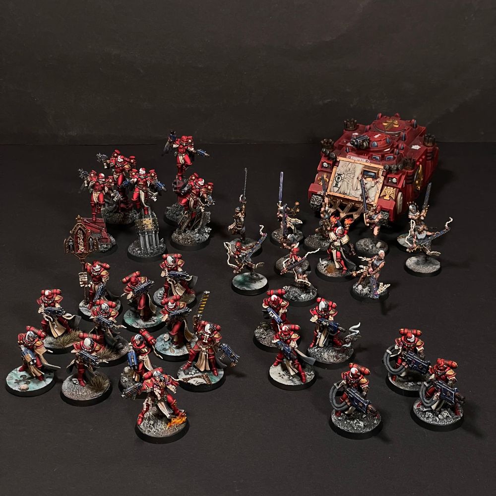 A small army of battle sisters from the order of bloody rose.
