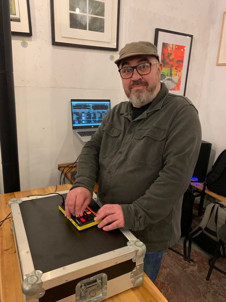 fat man plays with a sampler