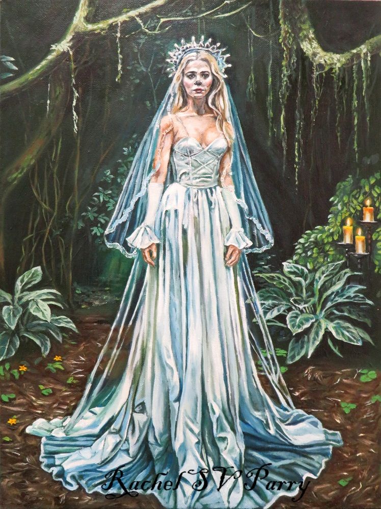 Mirkwood Bride. Queen of the magic wood, where magic and whimsy has regrown real nice. She's in a wedding dress and veil in the woods. It's candle lit.