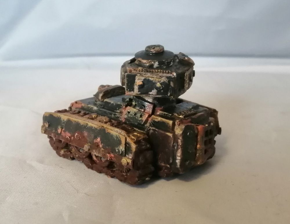 A scrapmetal tank in black. Rear/angled view.