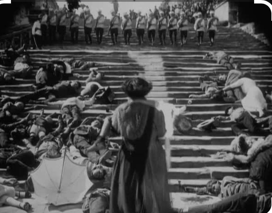 Frame from Sergei Eisenstein’s “Battleship Potemkin” with Russian troops shooting at civilians in Odesa. 