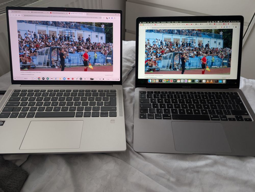 A close-up shot of a Lenovo Chromebook Plus laptop open on a table, showcasing its backlit keyboard and touchpad. The screen is on, but the display contents are out of focus. The laptop is surrounded by a few personal items.
Hashtags: