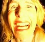 A photo of Laura Dern screaming in David Lynch's Inland Empire (2006).