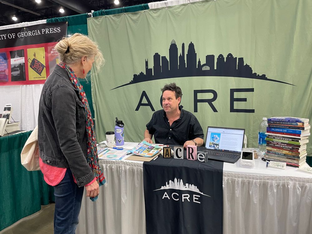 Kevin Prufer signing copies of his novel, SLEEPAWAY, at the AWP bookfair.