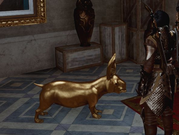 cropped screenshot from the video game dragon age inquisition.

a golden statue of a nug, an animal unique to the dragon age series.

the staue is about the size of a medium dog and the animal (its likeness larger than the actual creature) is a hairless pig, rabbit creature with grabby hand-paws and a mouth reminiscent of a rhino.

the room its in has light blue and white diamond pattern stone floors, white stone baseboards, crates stacked in the corner with a vase on one of them and a painting in a gold picture frame, the majority is cropped out and you can not tell what the painting is.

the playable character, the inquisitor named haliastur and pale skinned, dark haired elf in light scale armor with dual-daggers is looking away from the camera