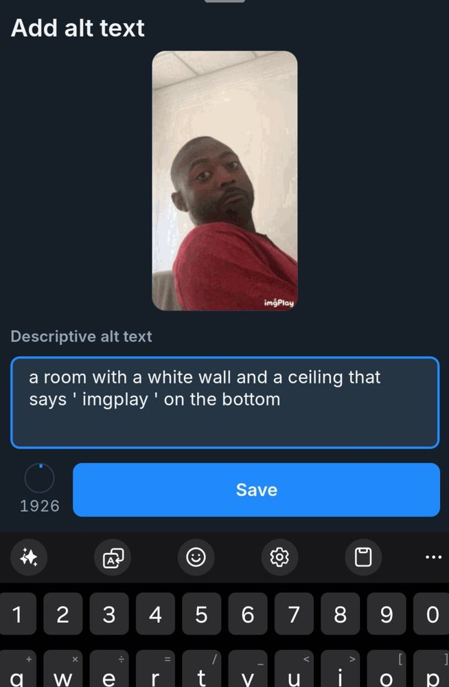 A screenshot of the "Add alt text" screen of a gif of a man leaning into frame with an intrigued or interested expression, and the default alt text reads; "A room with a white wall and a ceiling that says ' imgplay ' on the bottom"