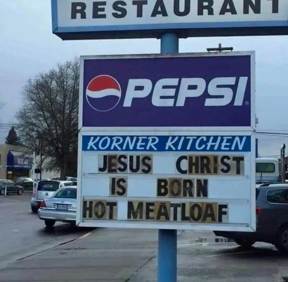 Korner Kitchen sign proclaiming Jesus Christ is born hot meatloaf.