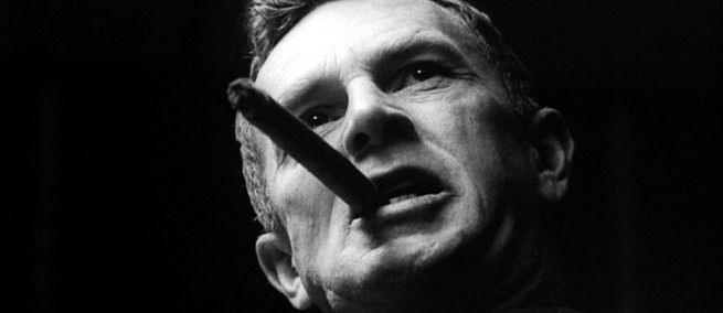 Jack D. Ripper from Dr. Strangelove with a cigar in his mouth