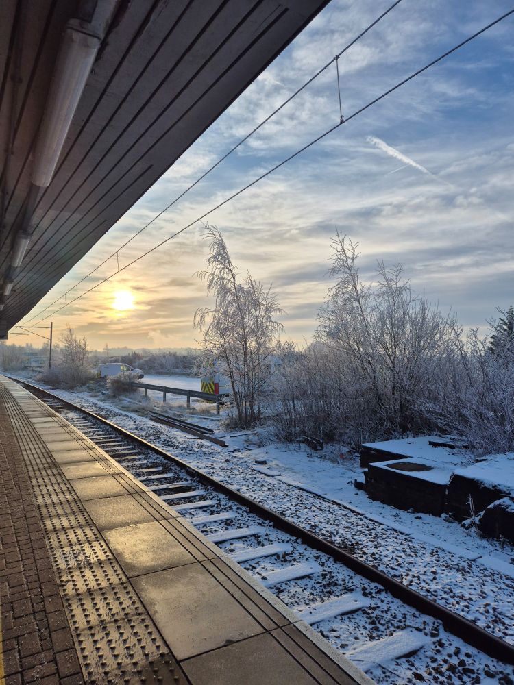 Wigans railway station on a very cold and frosty morning as the sun came up
