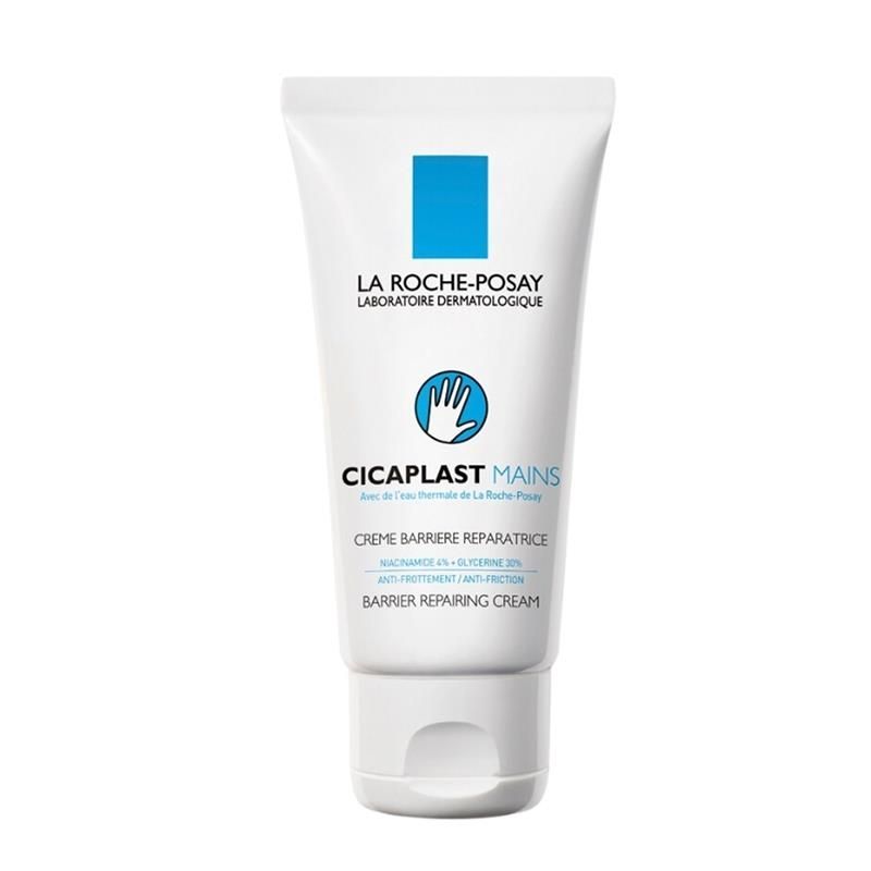 La Roche-Posay Cicaplast Mains Barrier Repairing Cream 50ml. A white tube with a blue rectangle on the top. In the middle of the tube is a blue circle with a white hand inside. Mains is French for hands, and is pronounced kinda like ma but with a short nasal A sound. 