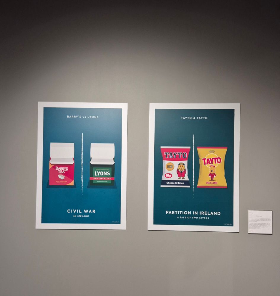 Two blue posters on a grey background. Left image has photos of Barry's teabags and Lyons teabags, with "Barry's vs Lyons" written above and "Civil War in Ireland" written below the photos. Right image has photos of Freestayto and Nordie Tayto with "Tayto & Tayto" written above and "Partition in Ireland A Tale of Two Taytos" written below the photos. 