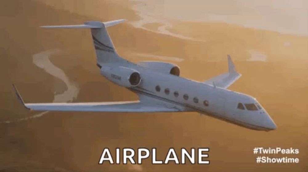 an airplane is flying in the sky with the word airplane written on the bottom