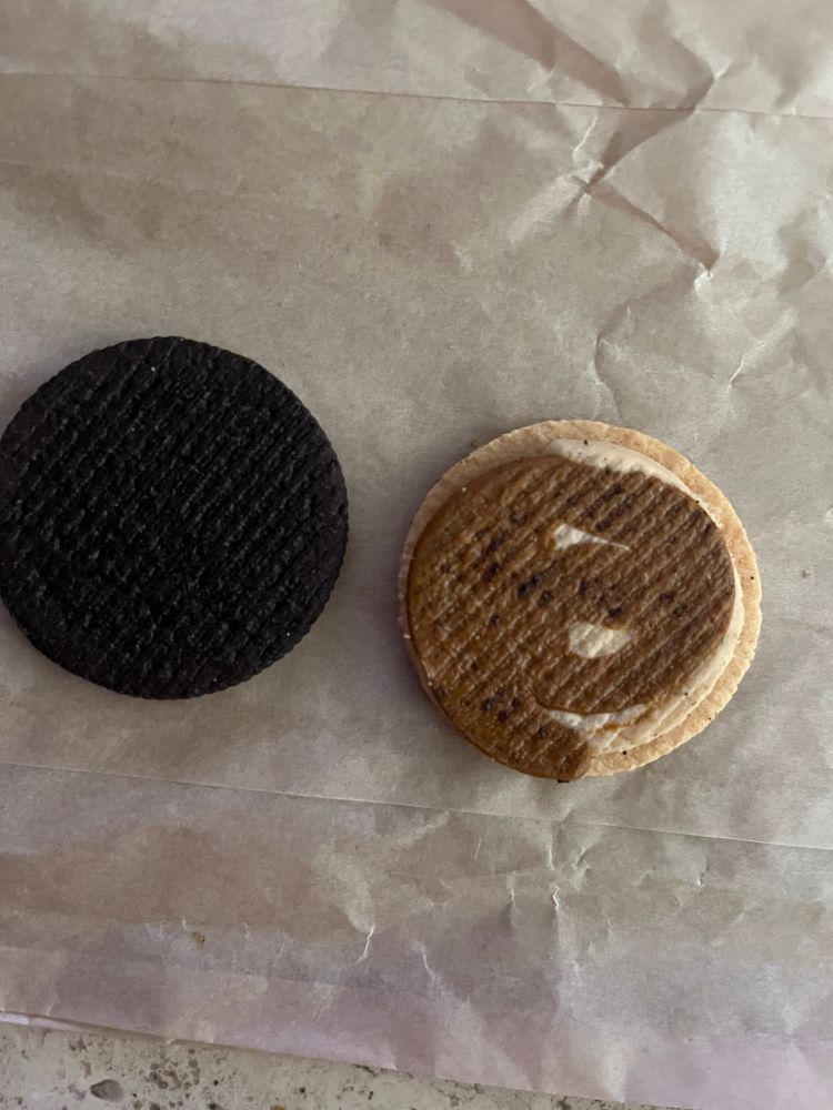 Innards of a single Post Malone Oreo with a poorly “swirled” creme