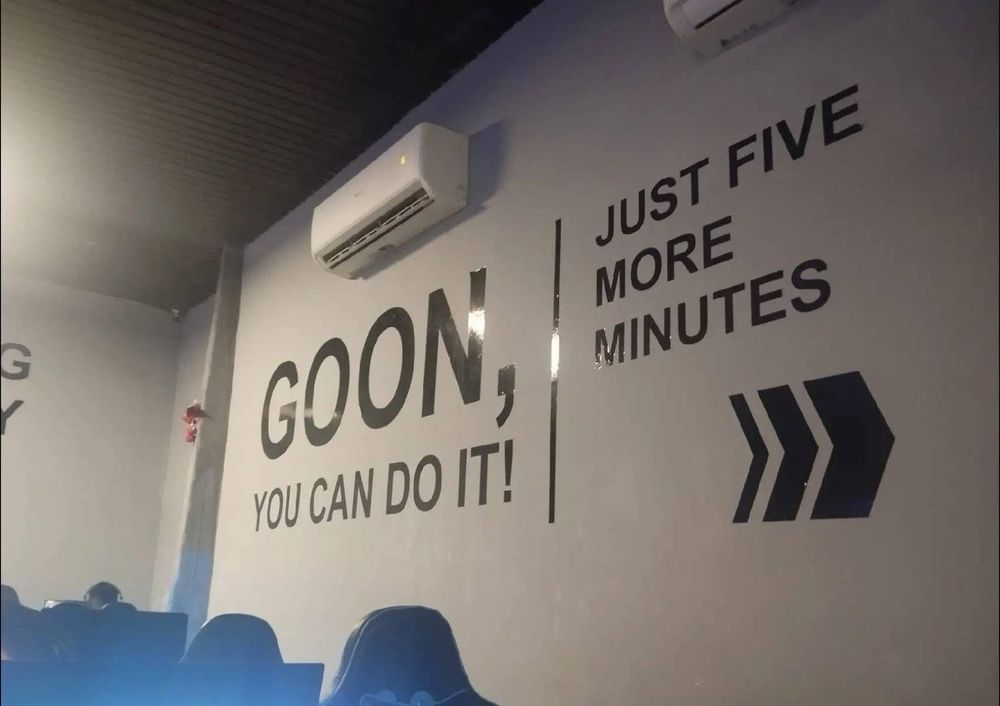 A sign that reads “GO ON, YOU CAN DO IT! JUST FIVE MORE MINUTES”

But it looks like it says GOON instead  due to bad kerning which has a VEEEEERY different meaning