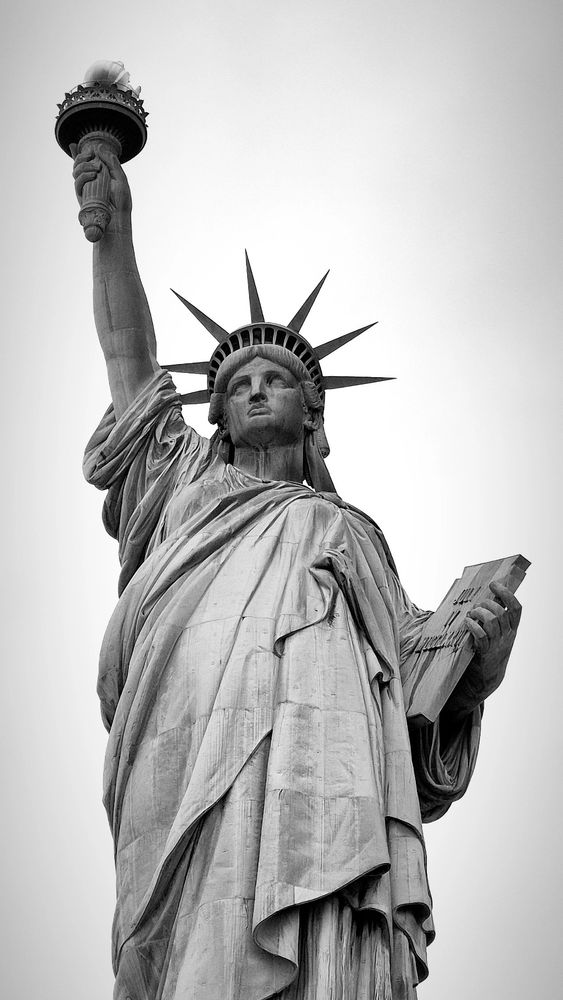 High contrast black and white photo of the Statue of Liberty