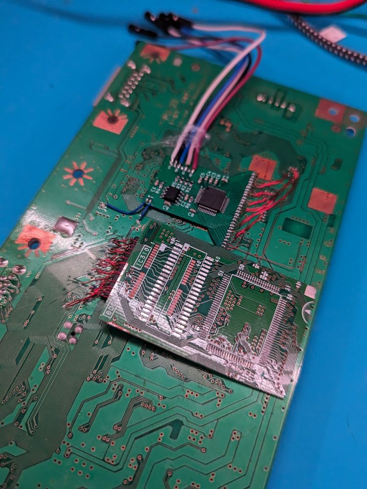 Fitting the SPU board into place. Seems like I'm gonna have to move the BIOS though! 🥺