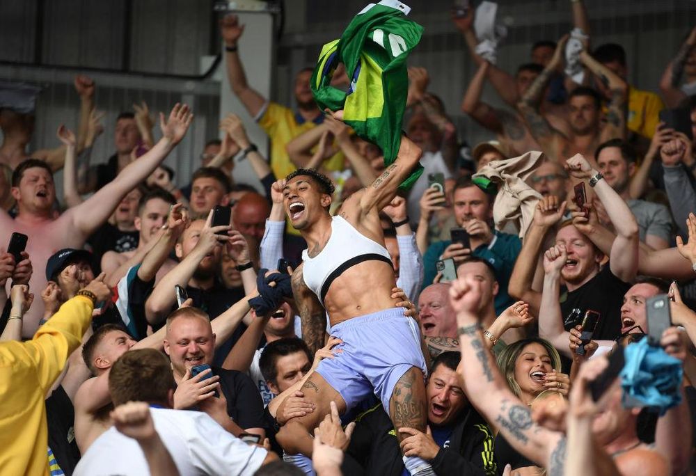 Raphinha celebrating in Leeds crowd