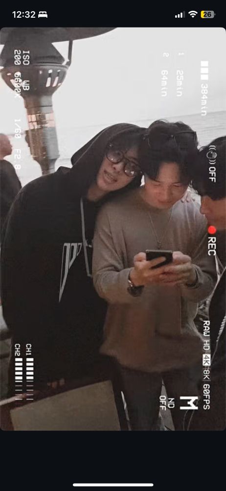 BTS RM & Jimin looking at their phone