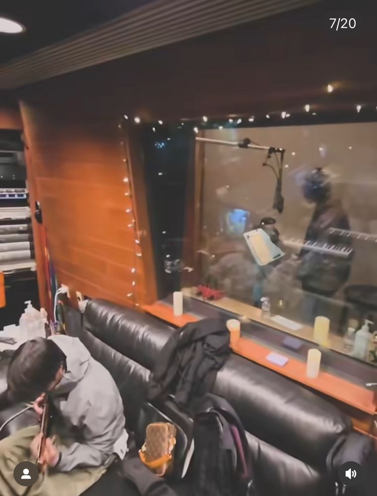 BTS member playing guitar and recording 