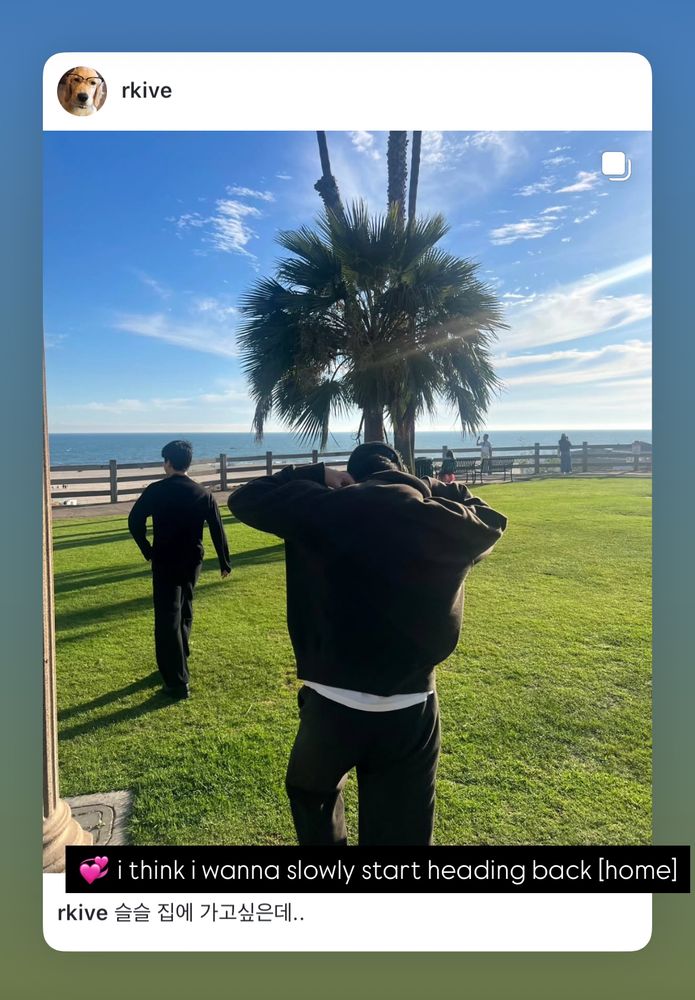 BTS RM backside w beach background. Caption reads "i think i wanna slowly start heading back [home]"