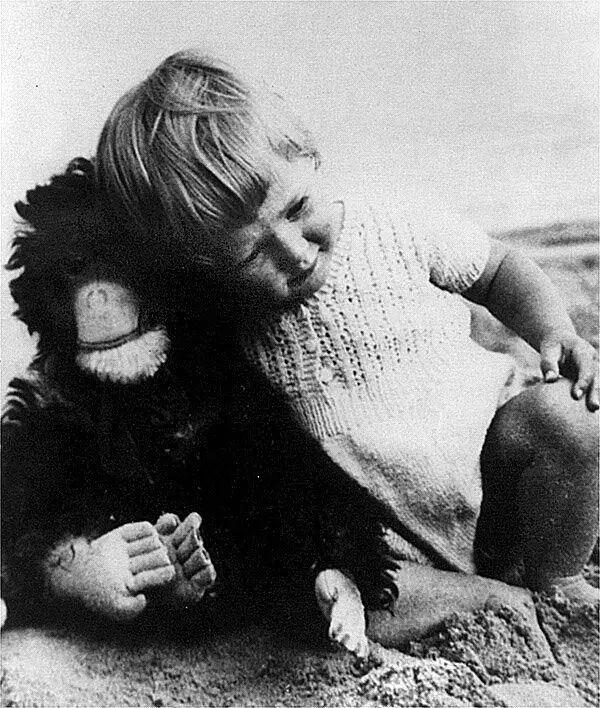 
Dr. Jane Goodall as a child with  a stuffed monkey doll that she named Jubilee. Photo from the Jane Goodall Institute.